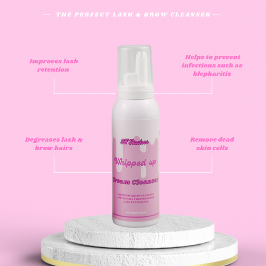 Whipped Up Cream Cleanser bottle on a pink background with text about its benefits.